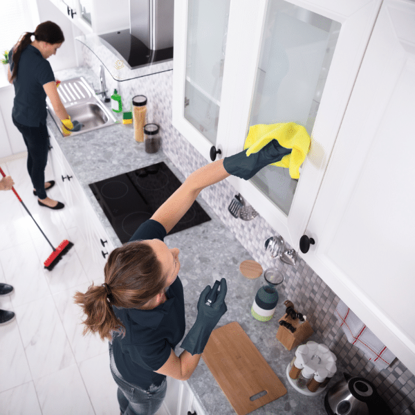 Recurring cleaning service in a modern residential kitchen