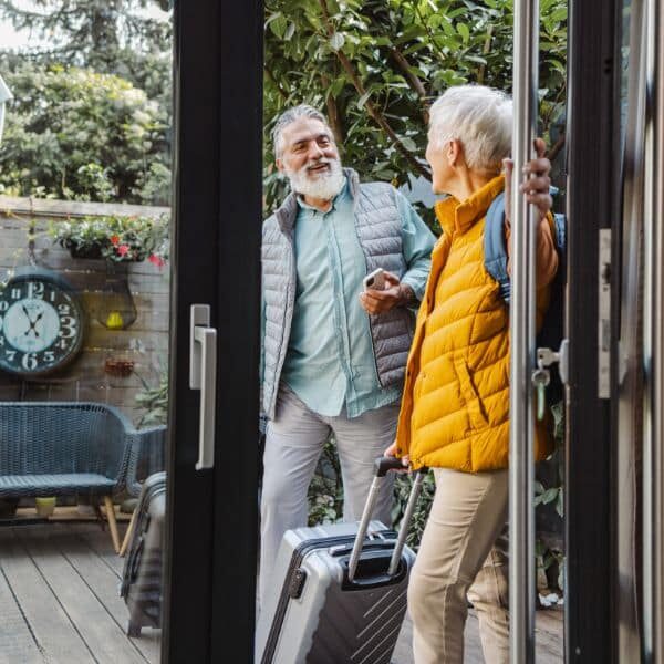 Happy guests arriving at a clean vacation rental